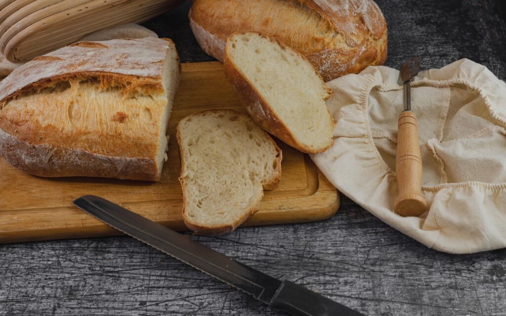 Amylase and xylanase enzymes enhancing bread volume, crumb structure and softness